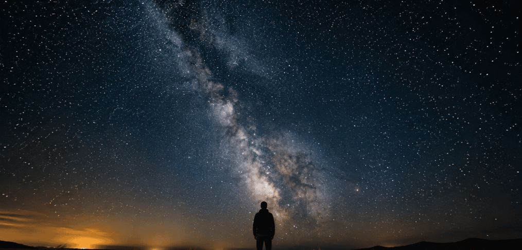Human silhouette under starry sky - narcissistic wounds and artificial intelligence